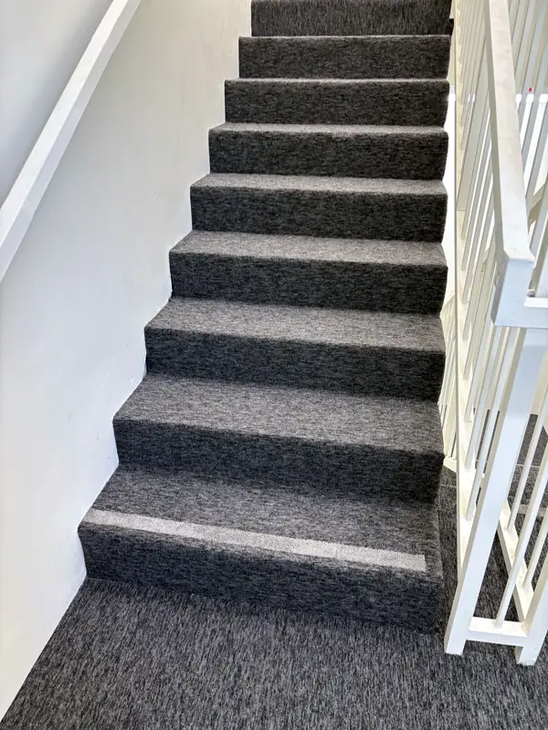 Graphite carpet — stairs and landing — Dream Space Remodel flooring job