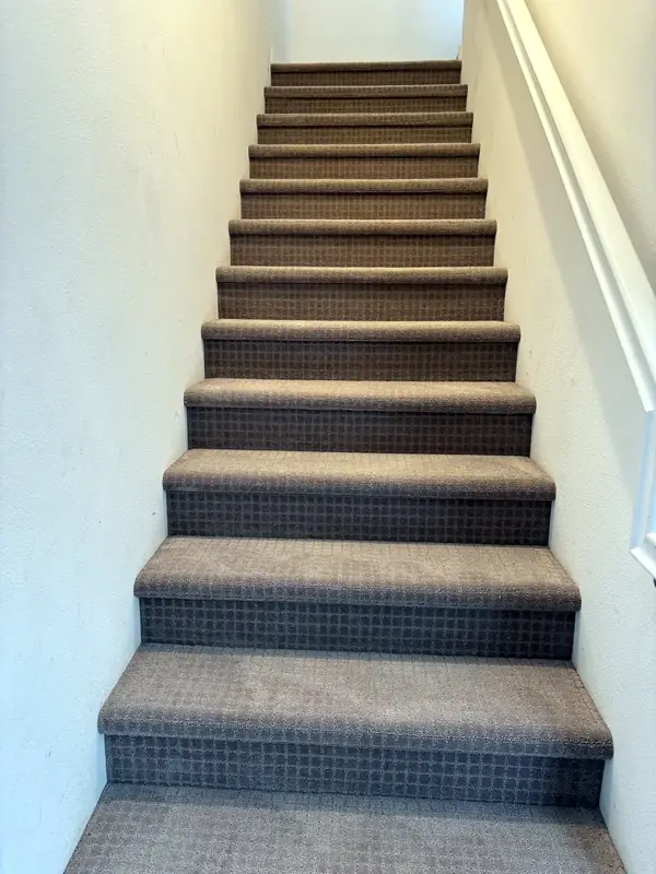 Two-tone patterned stair carpet