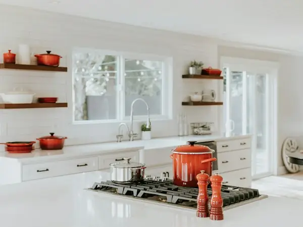 Modern white kitchen with open shelving