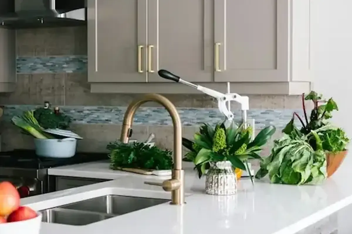 Quartz countertop with a brass faucet