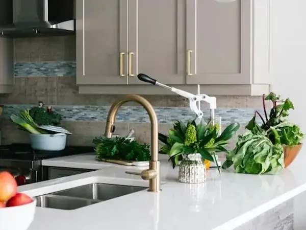 Quartz countertop with a brass faucet