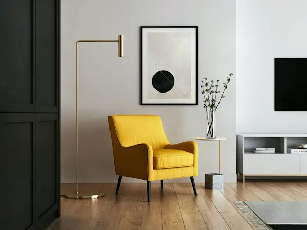 Living room with a yellow armchair and wood floors